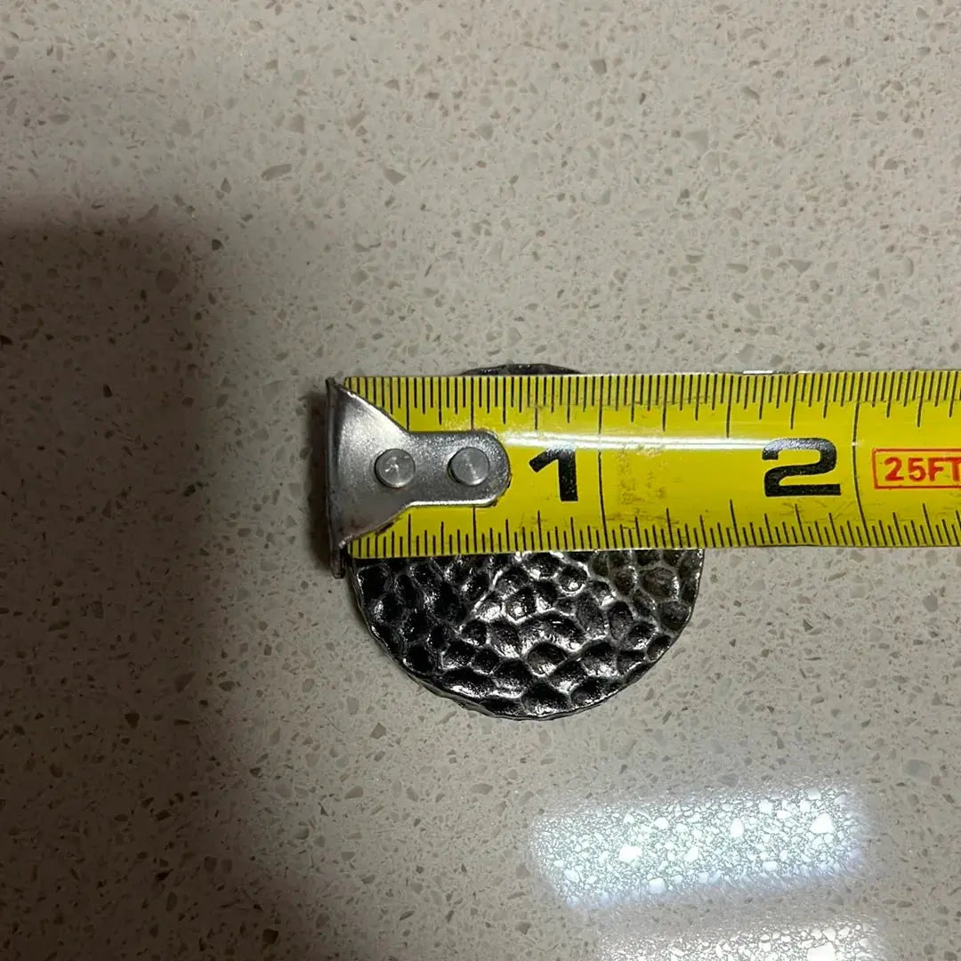 Silver hammered concho with Screw