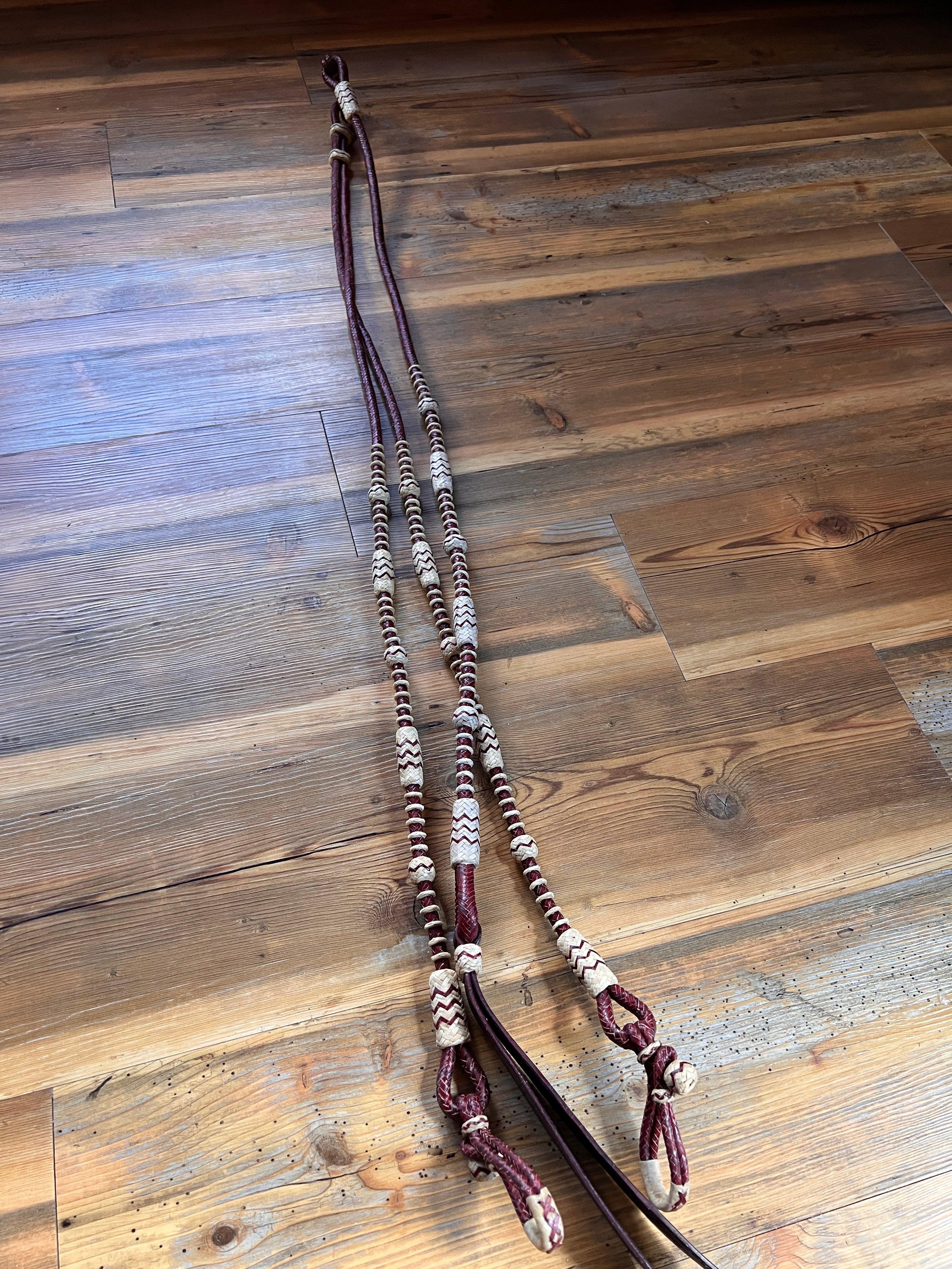 Brown cream 20-plait romal reins with beads, California style, 55 inches