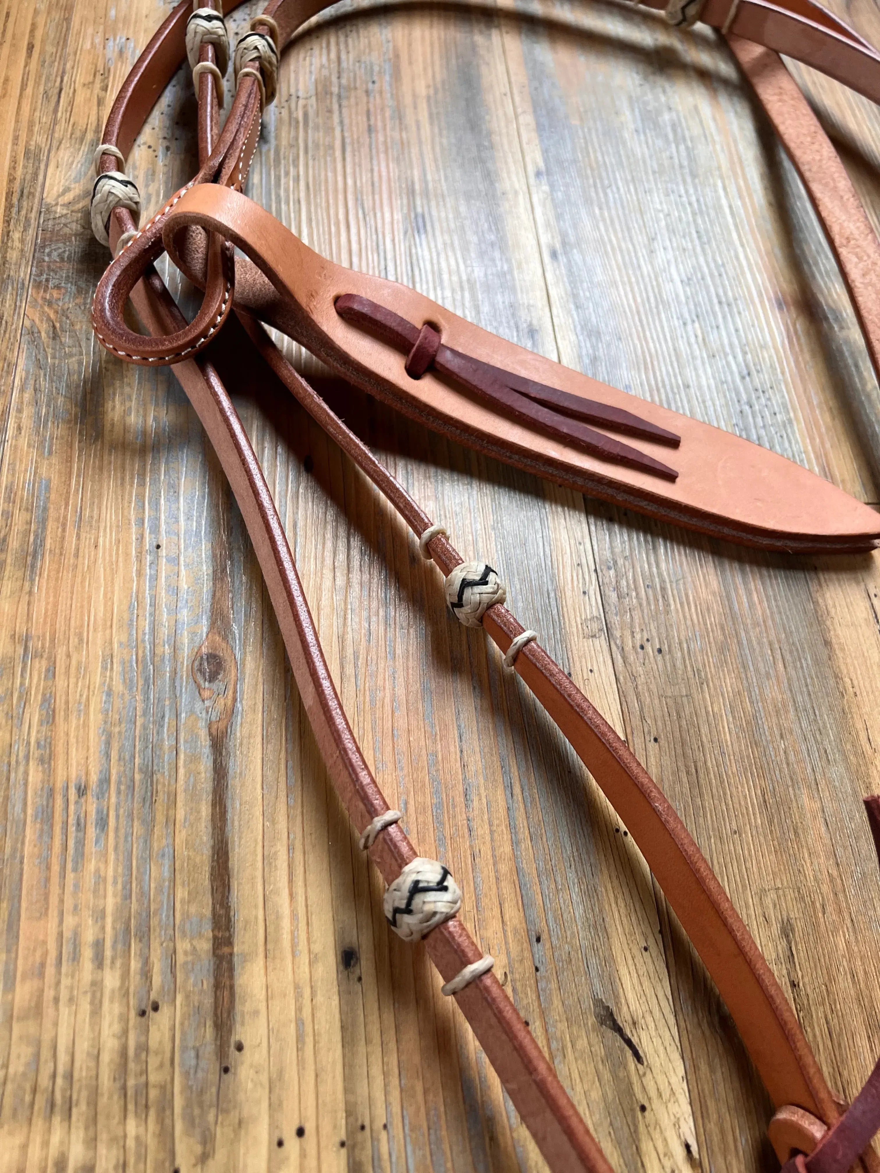 Tan leather horse bridle with white black knots for 8 Flat Leather Romal Reins