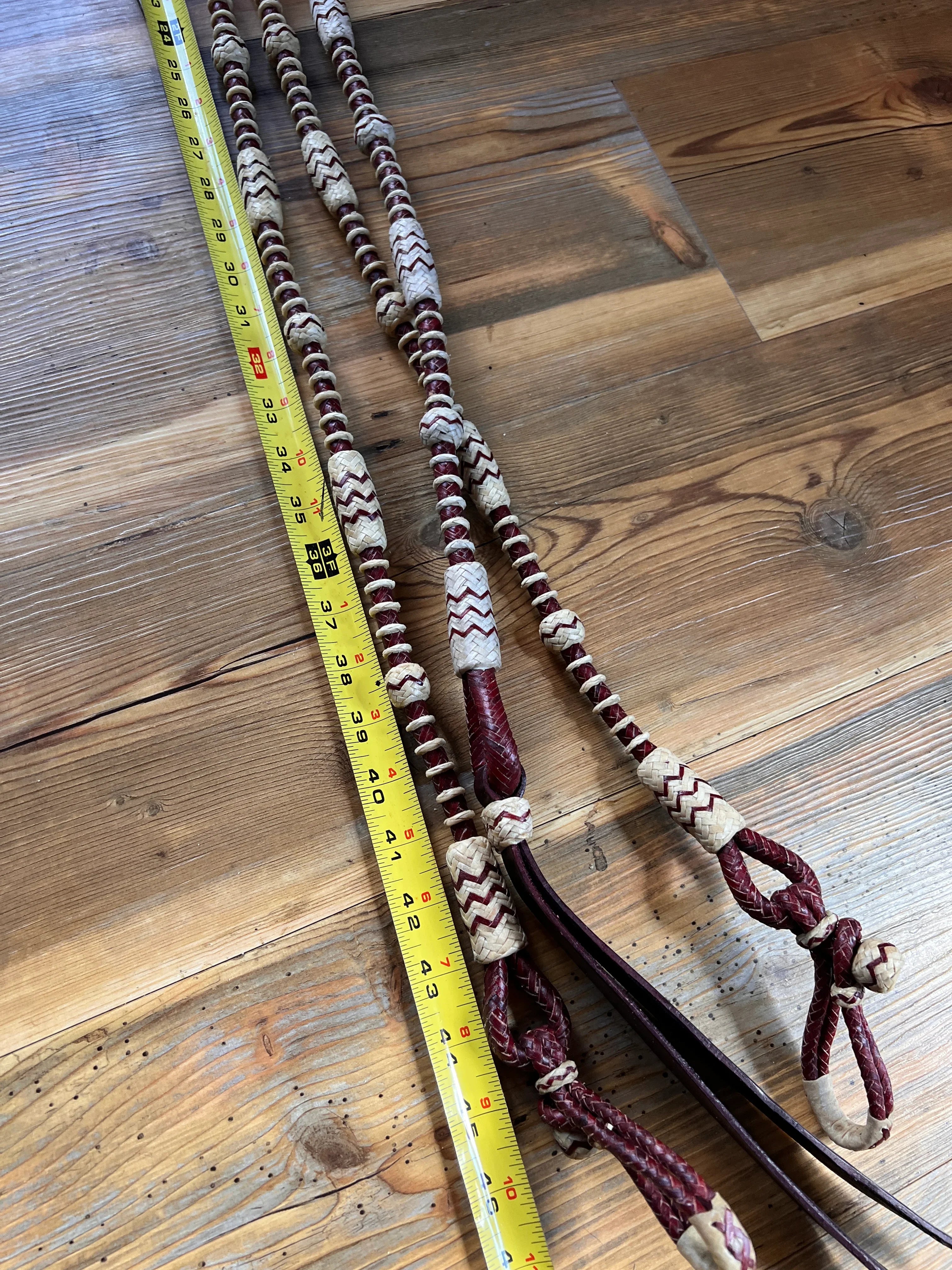 Maroon cream braided leather Romal reins with zigzag beads, 20 plaits