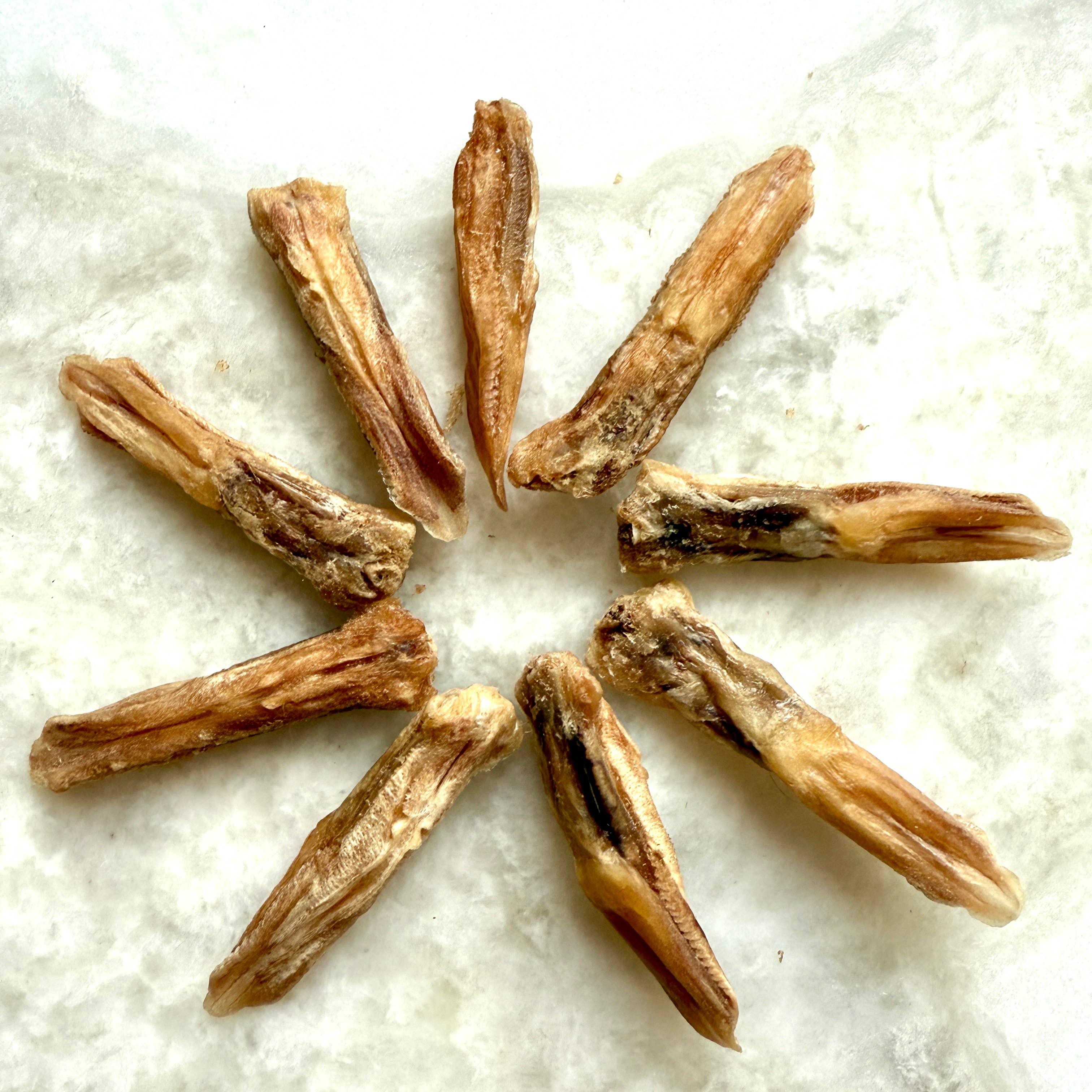 Freeze-dried duck tongues treats in light brown circular pattern