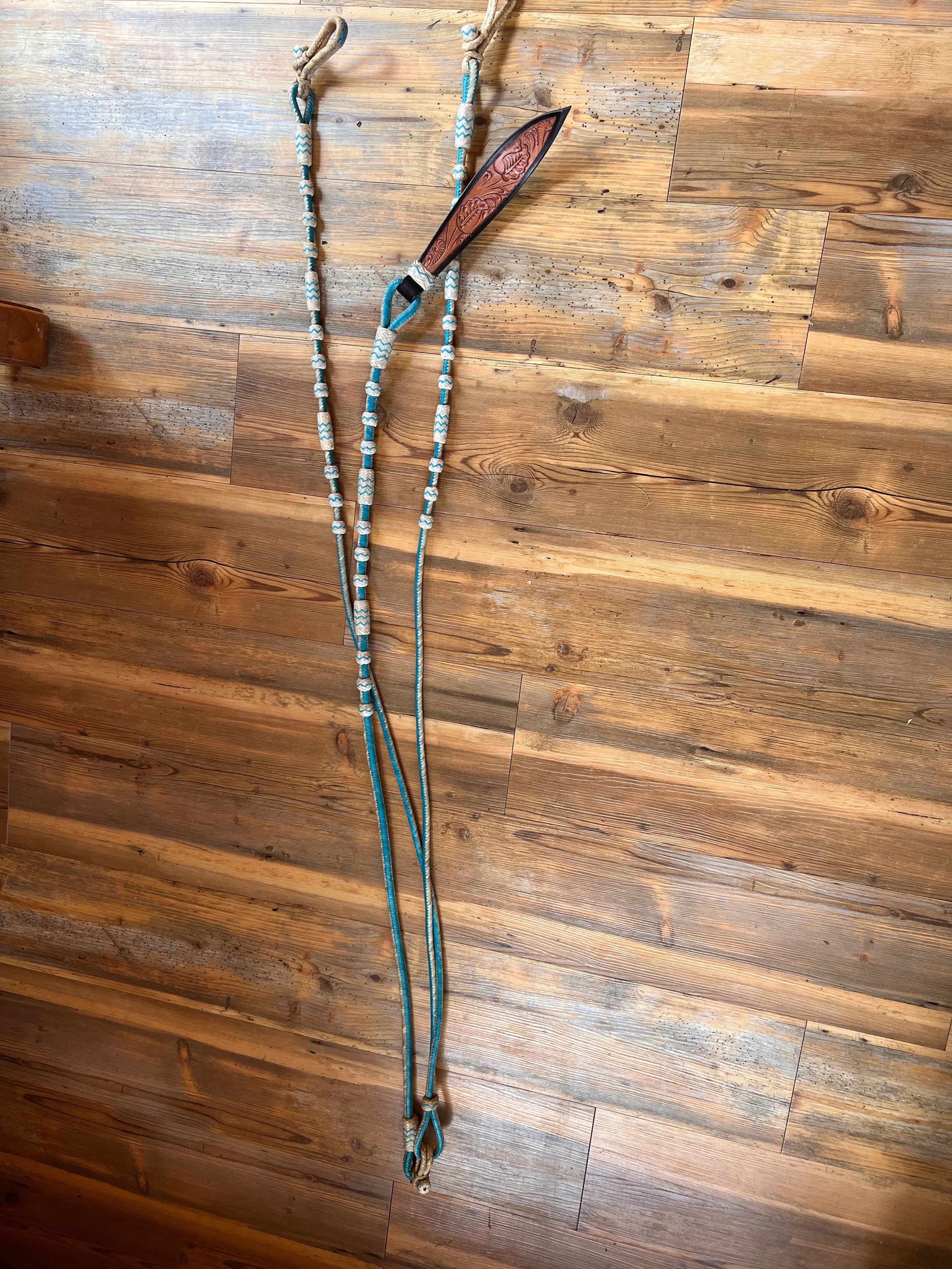 Teal silver beaded horse halter with brown leather headpiece Romal reins