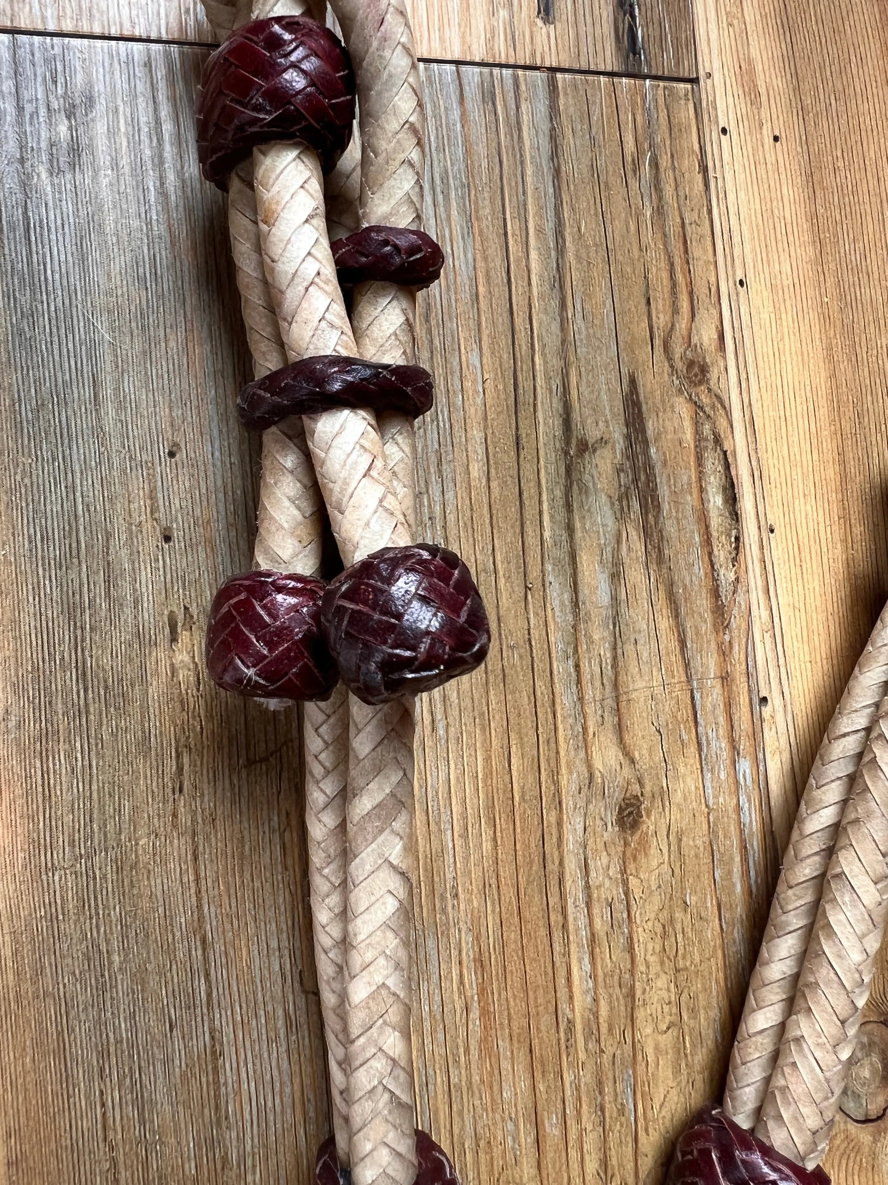 Hand-crafted Western one-ear headstall with beige rope and red beads