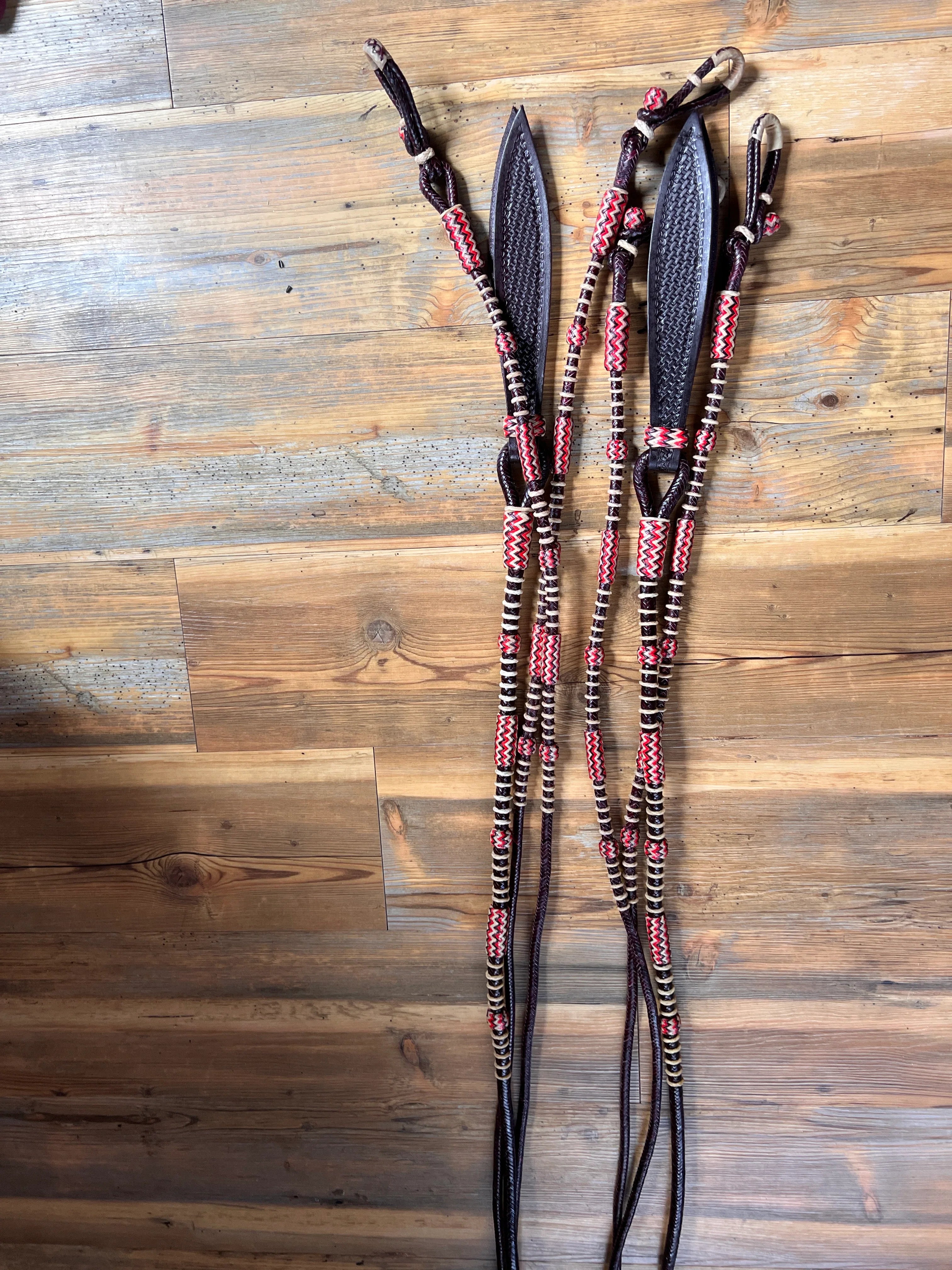 Three black leather Romal reins with red beige braids, California style