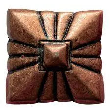 Copper pyramid embossed shape concho