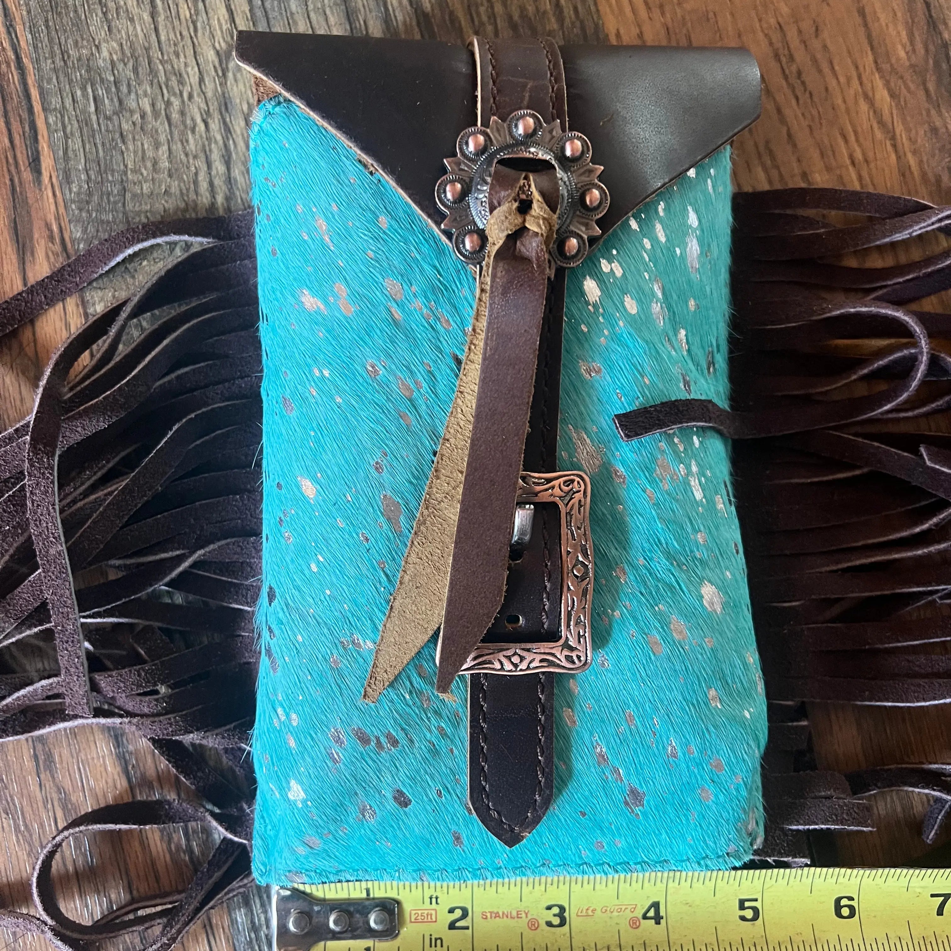 Acid wash teal hair-on cowhide saddle bag rear cinch back view