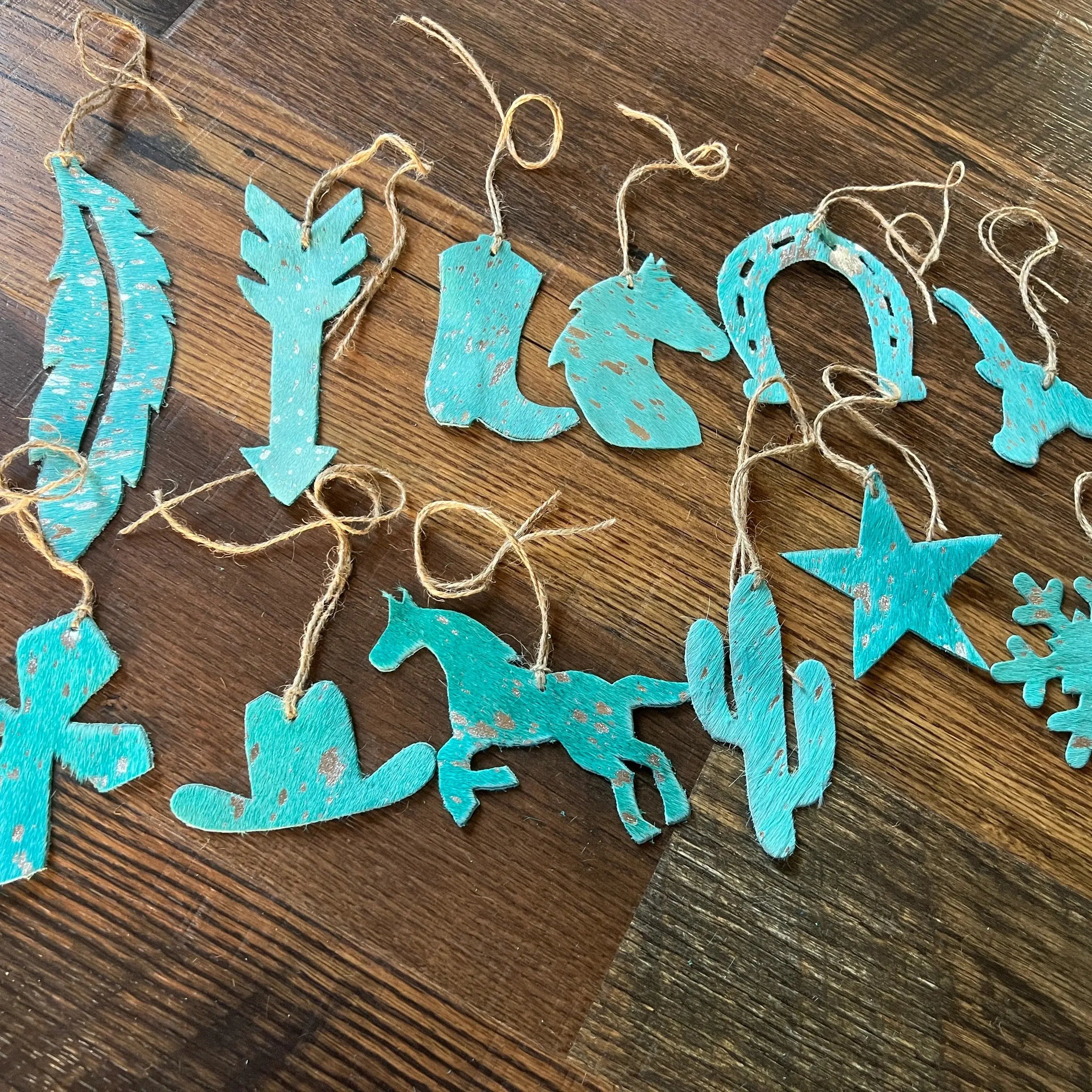 Teal leather cowhide Christmas ornament with turquoise wooden cutouts