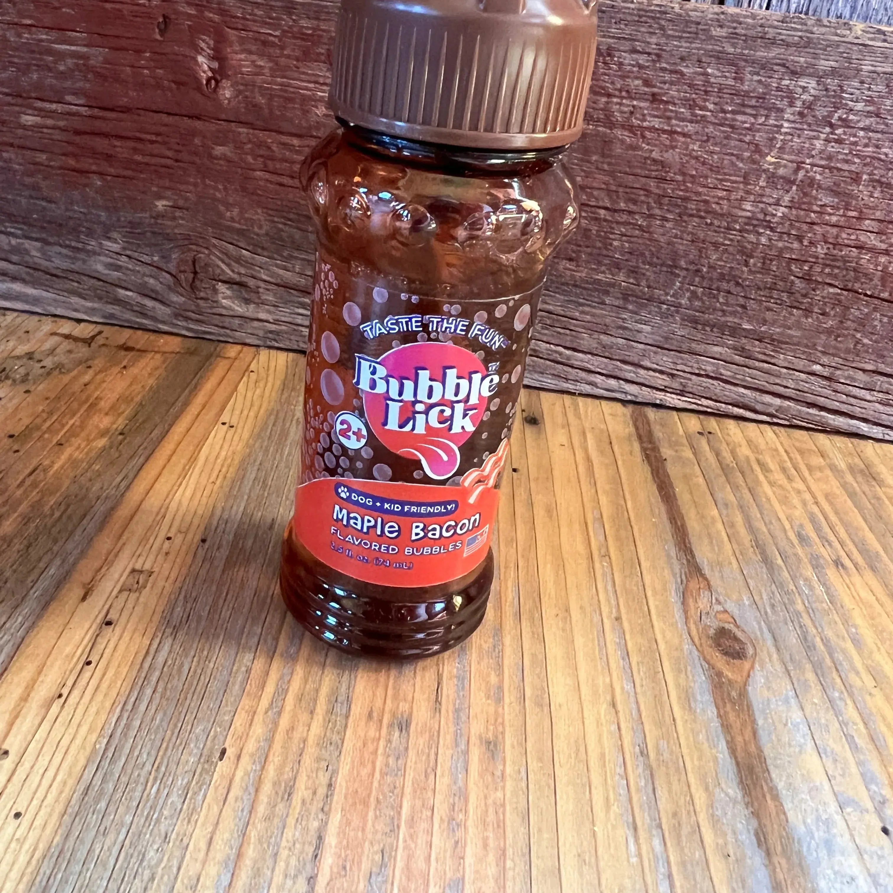 Bubble Lick maple bacon edible bubble gum in textured brown bottle