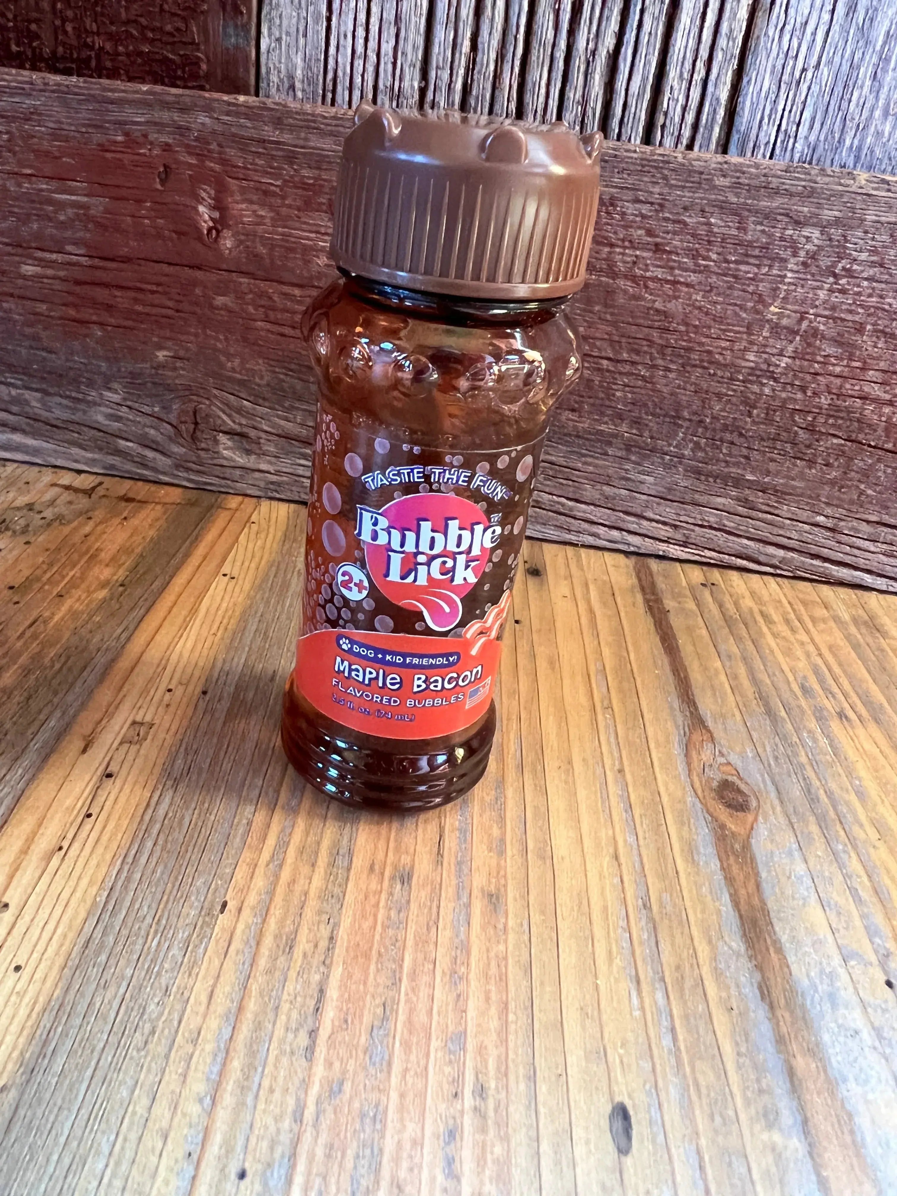 Bubble Lick maple bacon edible bubble gum in textured brown bottle