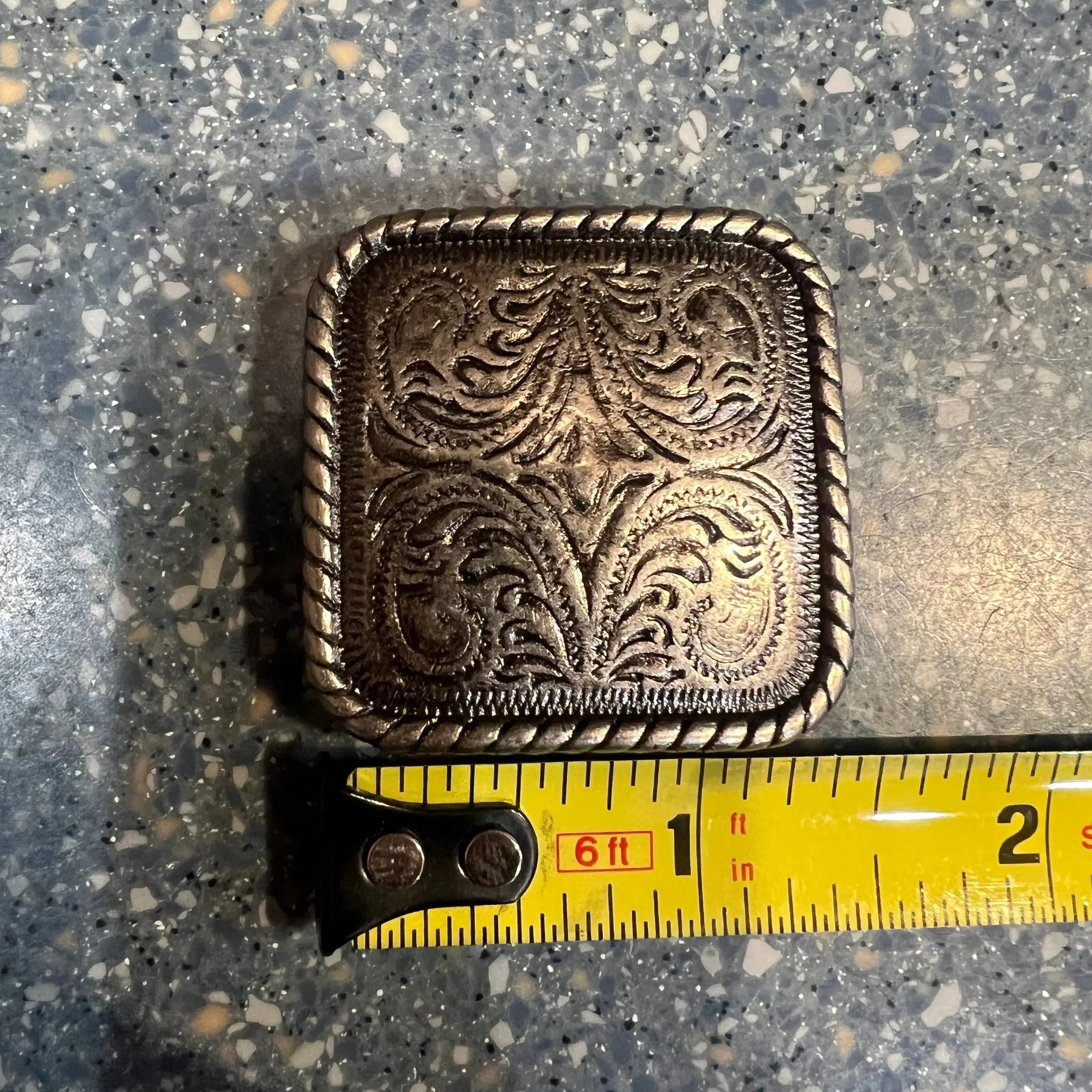 Silver engraved square concho with screw