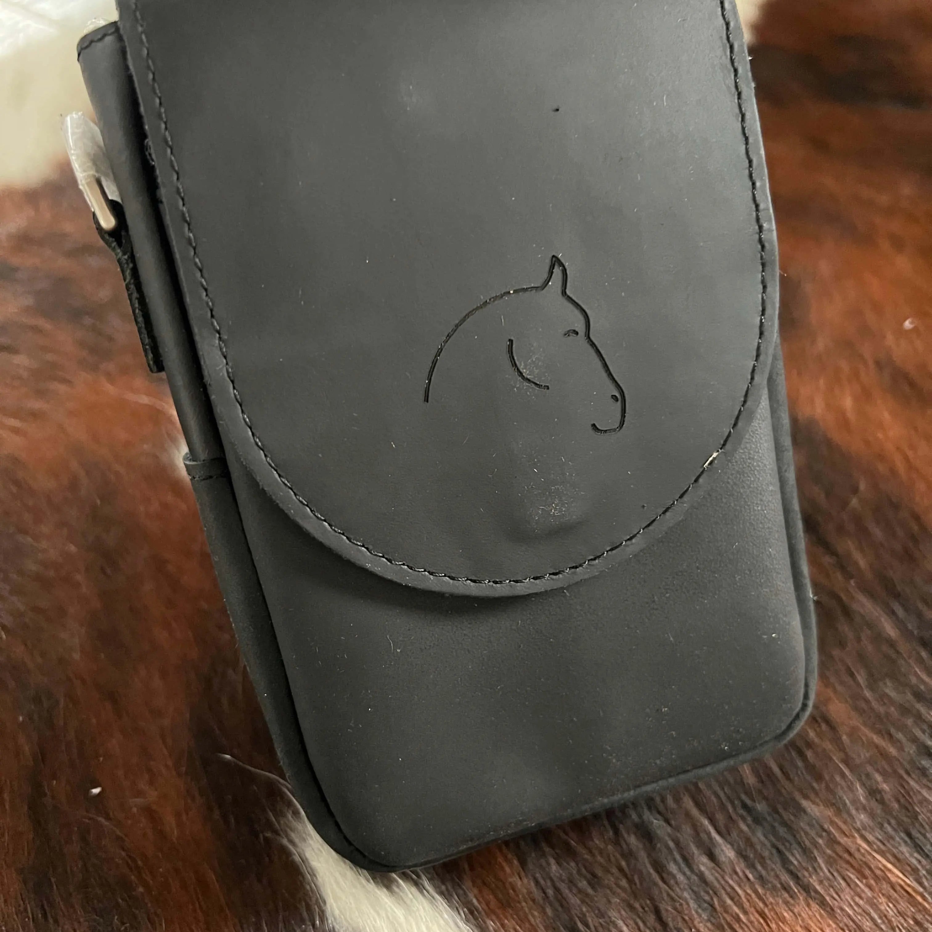 Black leather Horse Holster phone case back with embossed horse design