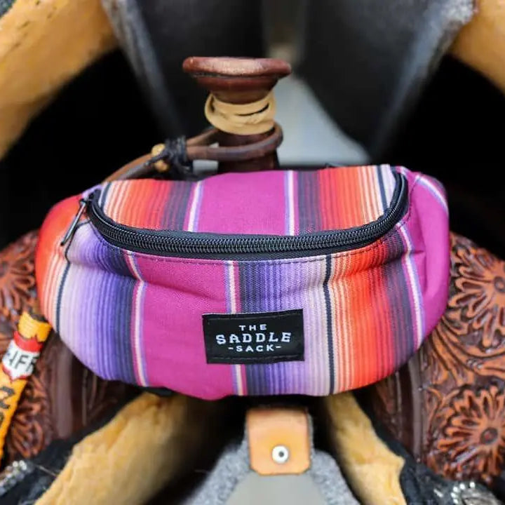 Vibrant multicolored striped Saddle Sack fanny pack with black zipper