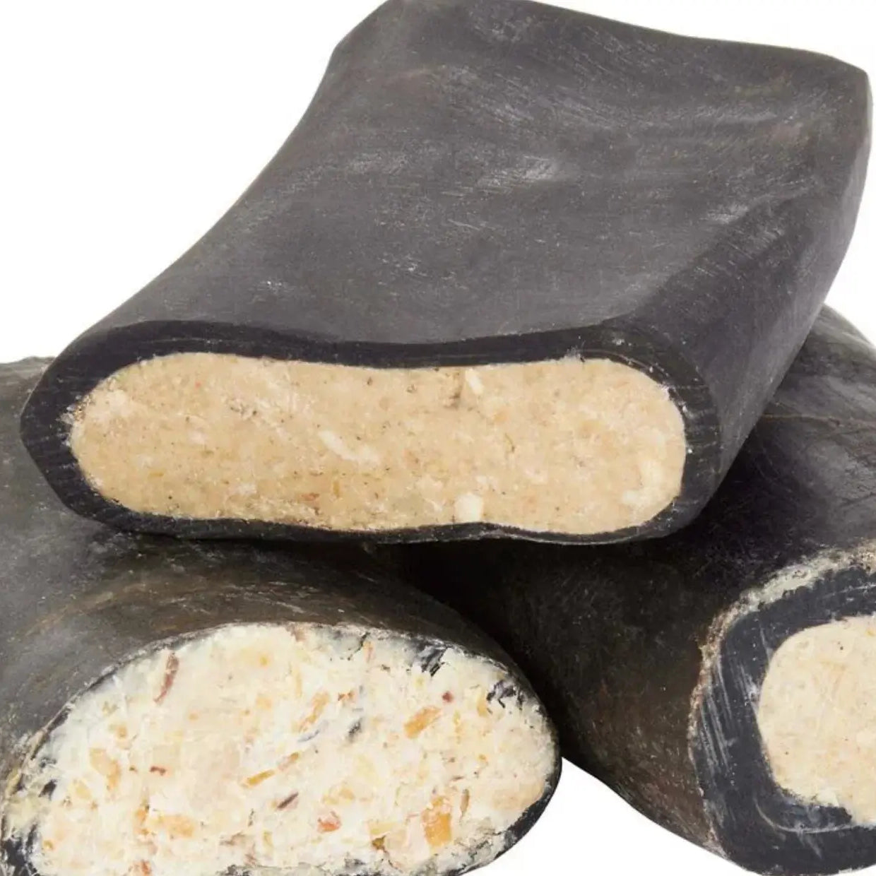 Peanut Butter Stuffed Horn: black bone chew toy with textured exterior and crumbly core