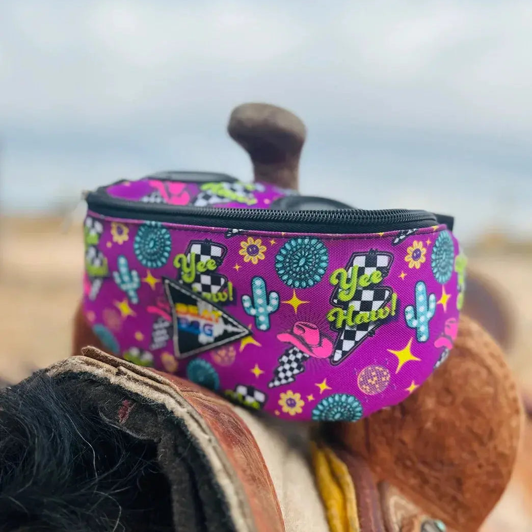 Vibrant purple Beat Bag fanny pack with cactus, checkered flag, yee haa graphics