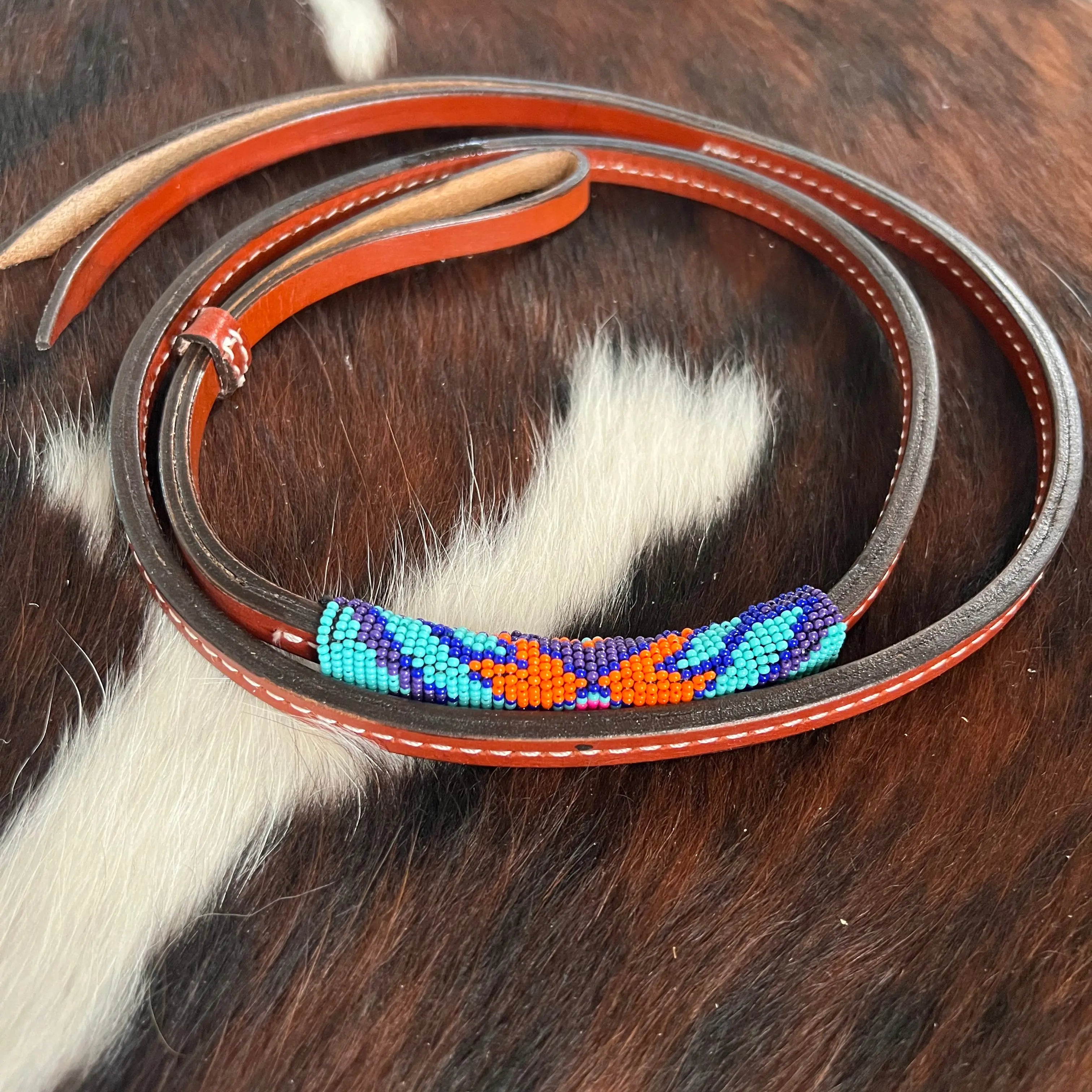 4ft Leather over & under whip with teal, purple, and orange beaded overlay. Horse