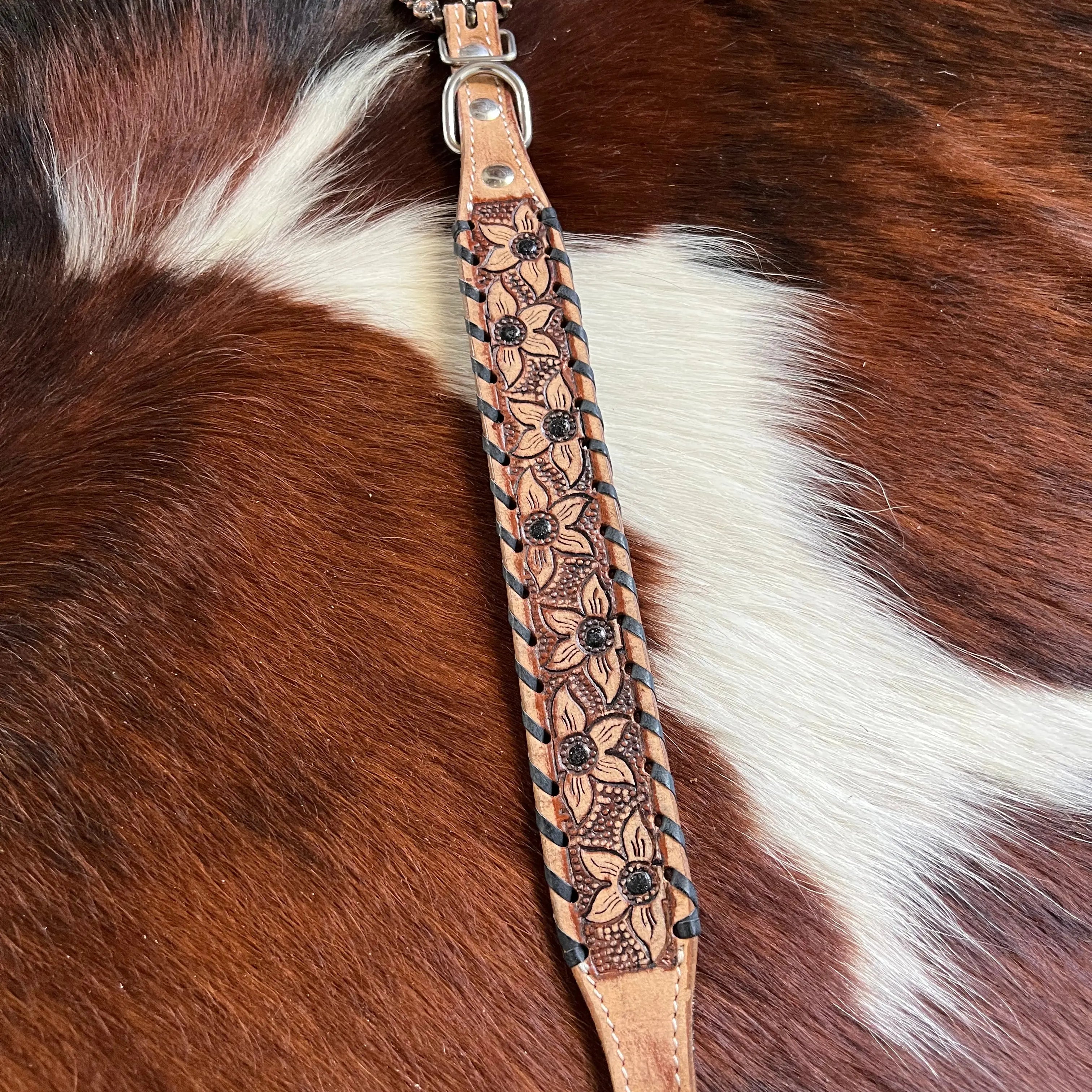 Genuine leather dog collar with black rawhide. Dog