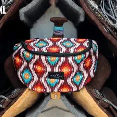 Saddle Sack XL fanny pack with vibrant red orange teal geometric pattern