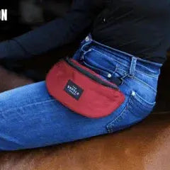 Maroon Saddle Sack waist pouch with black logo patch