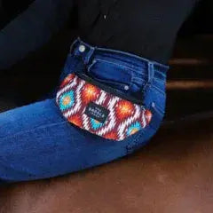 Vibrant Saddle Sack fanny pack with geometric red, orange, blue pattern