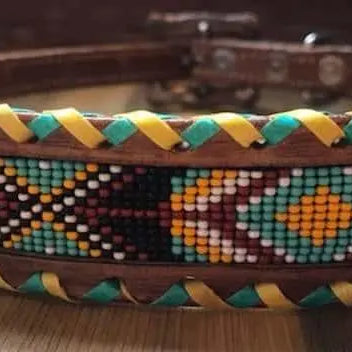 Genuine leather dog collar with teal, white, yellow and burgundy southwest beaded inlay design, a rawhide wrapped edge Dog