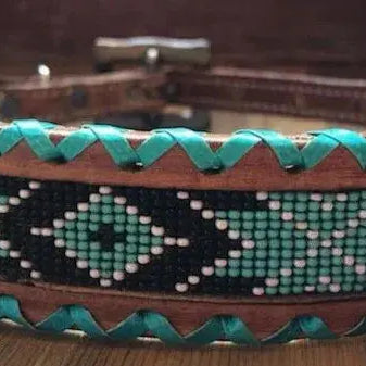 Genuine leather dog collar with teal, white, and black southwest beaded inlay design, a rawhide wrapped edge Dog
