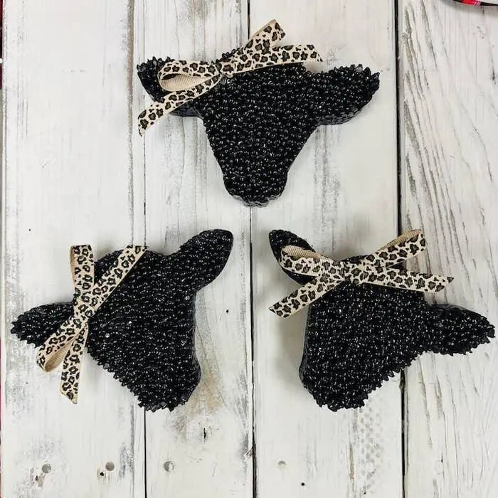 Black textured cow head air freshener with leopard bows, Cow Smelly Jelly scent