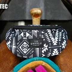 The Saddle Sack black and white geometric saddle bag with wooden handle