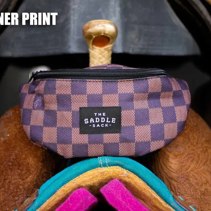 Purple and beige checkered The Saddle Sack with black label