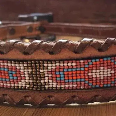 Genuine Leather dog collar with pink, white, and gold southwest beaded inlay design, a leather wrapped edge Dog