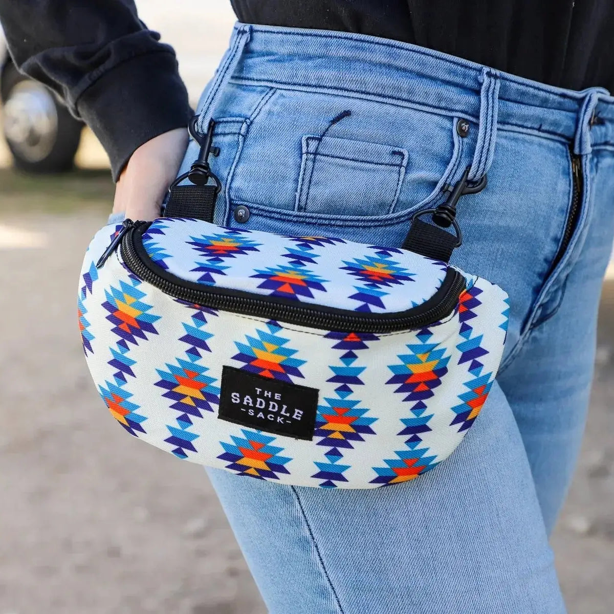 Saddle Sack fanny pack with vibrant blue orange purple geometric pattern