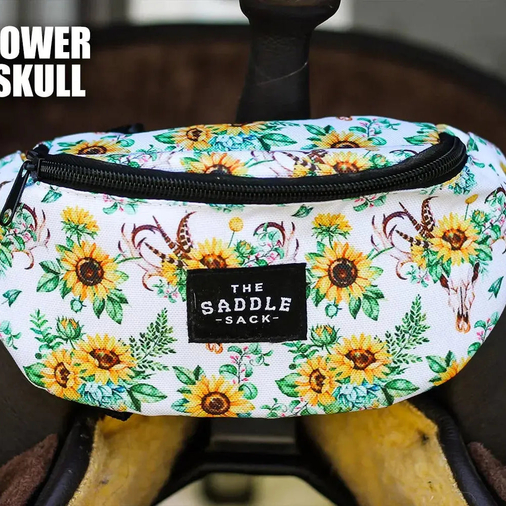 The Saddle Sack: white saddle bag with sunflower bull skull pattern