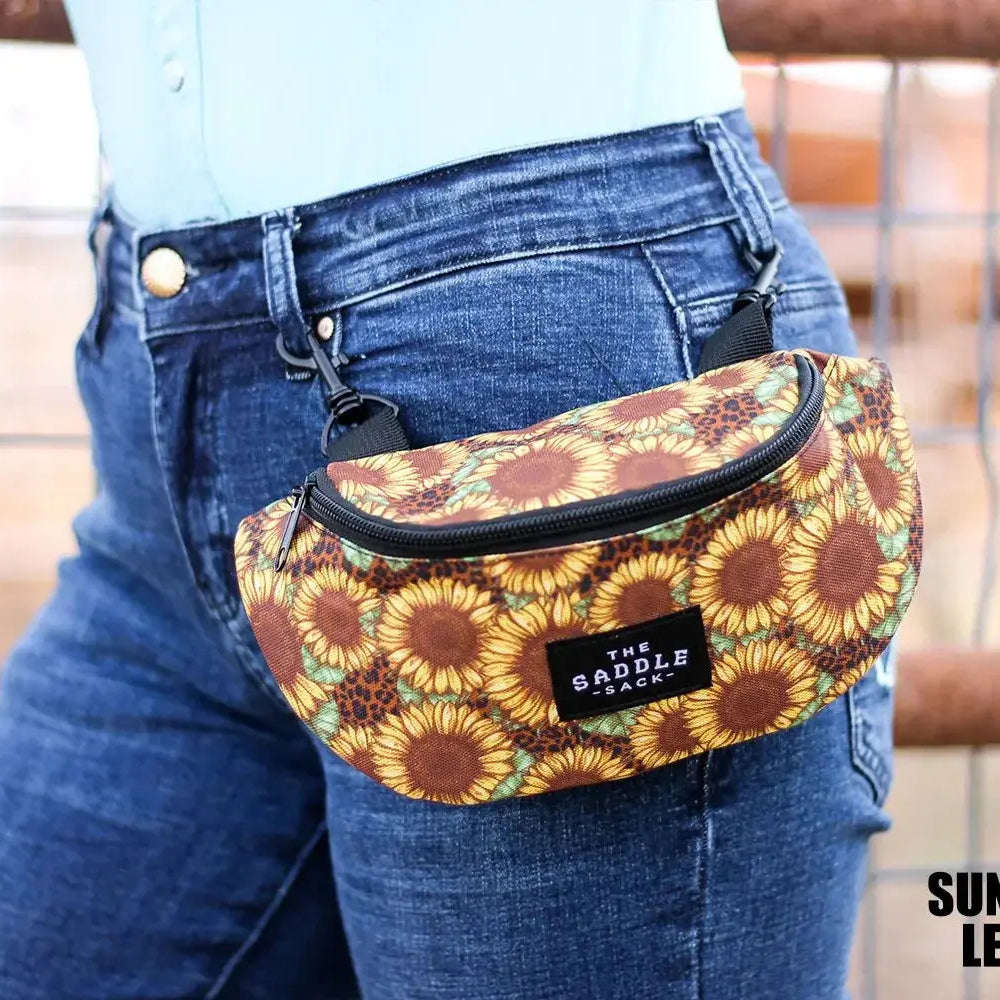 Saddle Sack English Hip Sack with vibrant sunflower pattern and black zippers