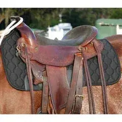 Brown leather saddle with black quilted Benefab therapeutic western pad on horse