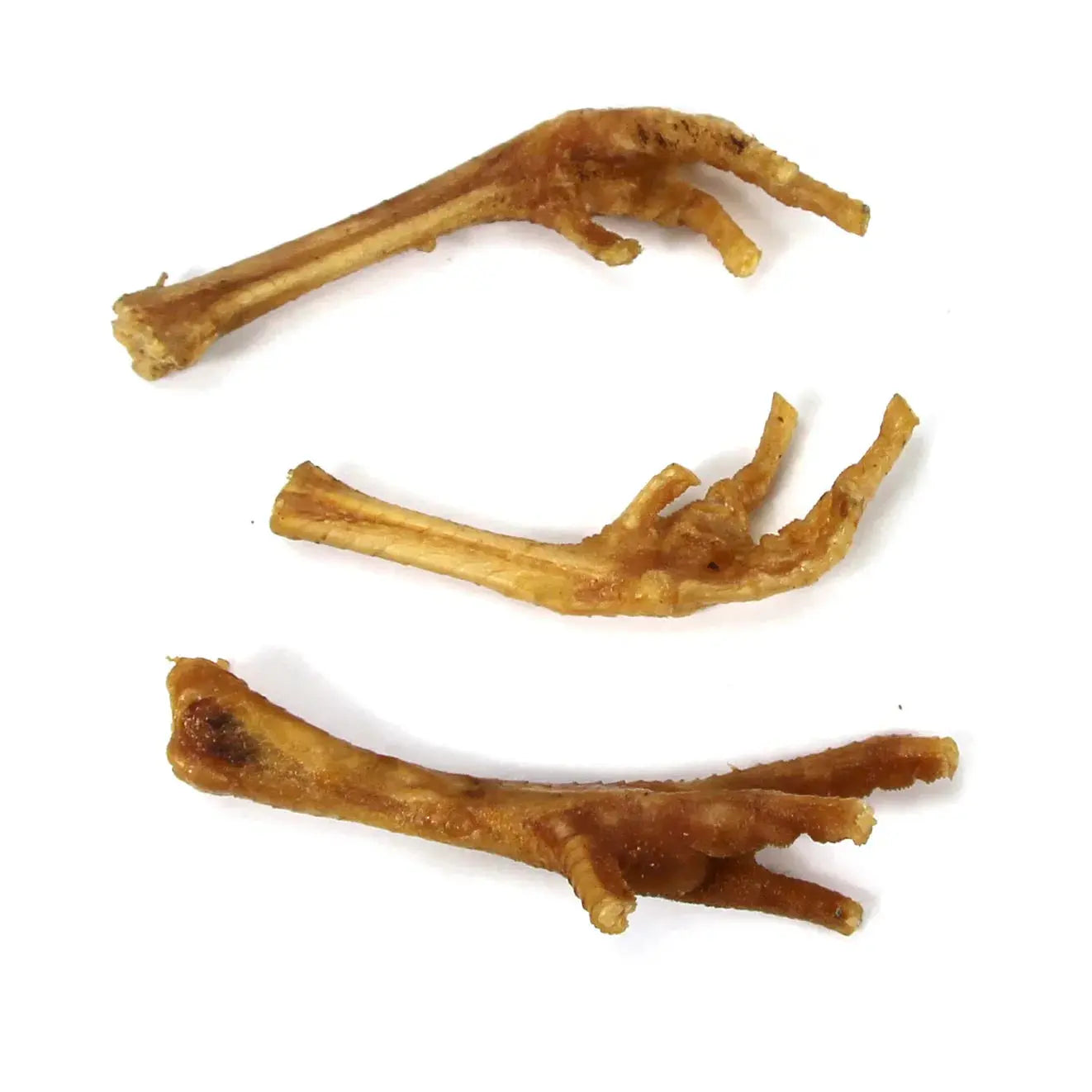 Three dried chicken feet with golden-brown hue and natural bones