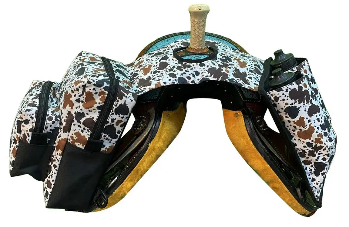 Cow print saddlebag with white brown black pattern turquoise accent