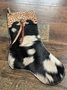 Black and white cowhide Christmas stocking with cheetah cuff
