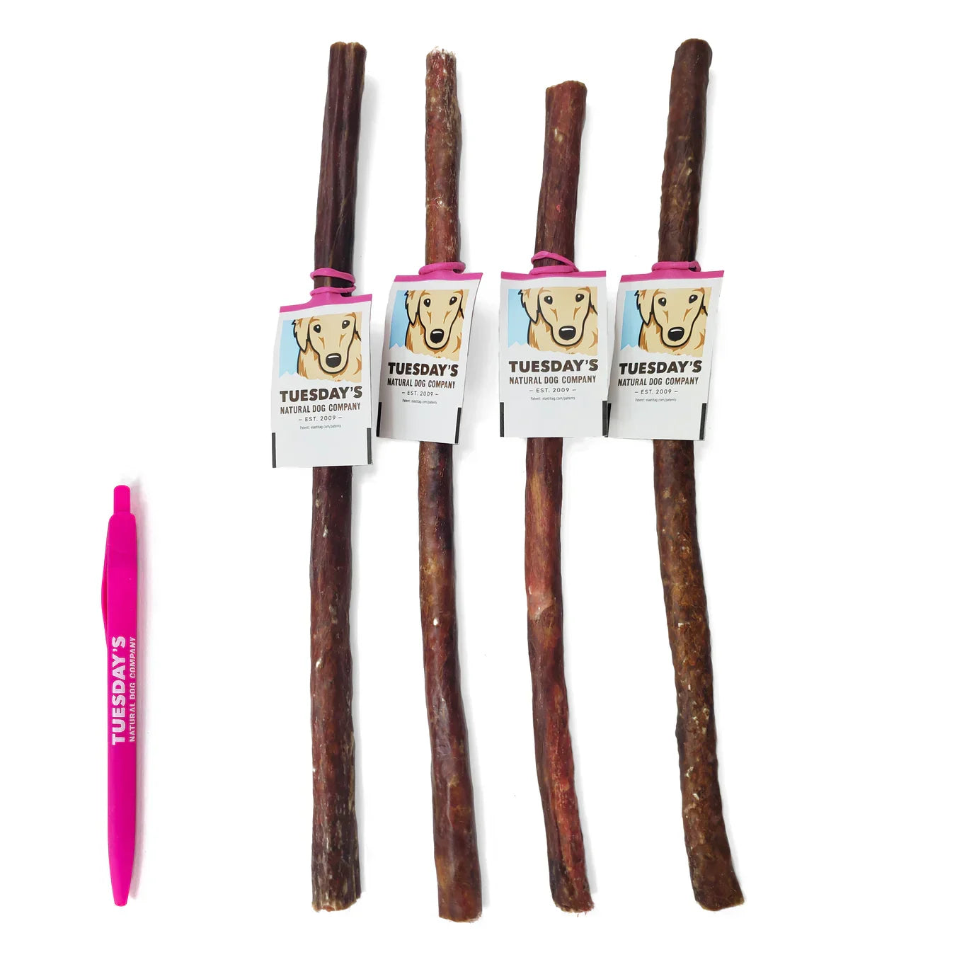 Four 12’’ dark brown pork chewy bulls by Tuesdays Natural Dog Company with pink ribbons