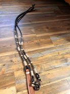 Black and tan 10-plait hand-braided romal reins, 55 inches with connectors