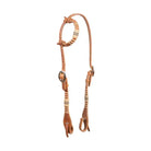 Tan leather one ear rawhide horse headstall with woven patterns and silver buckle