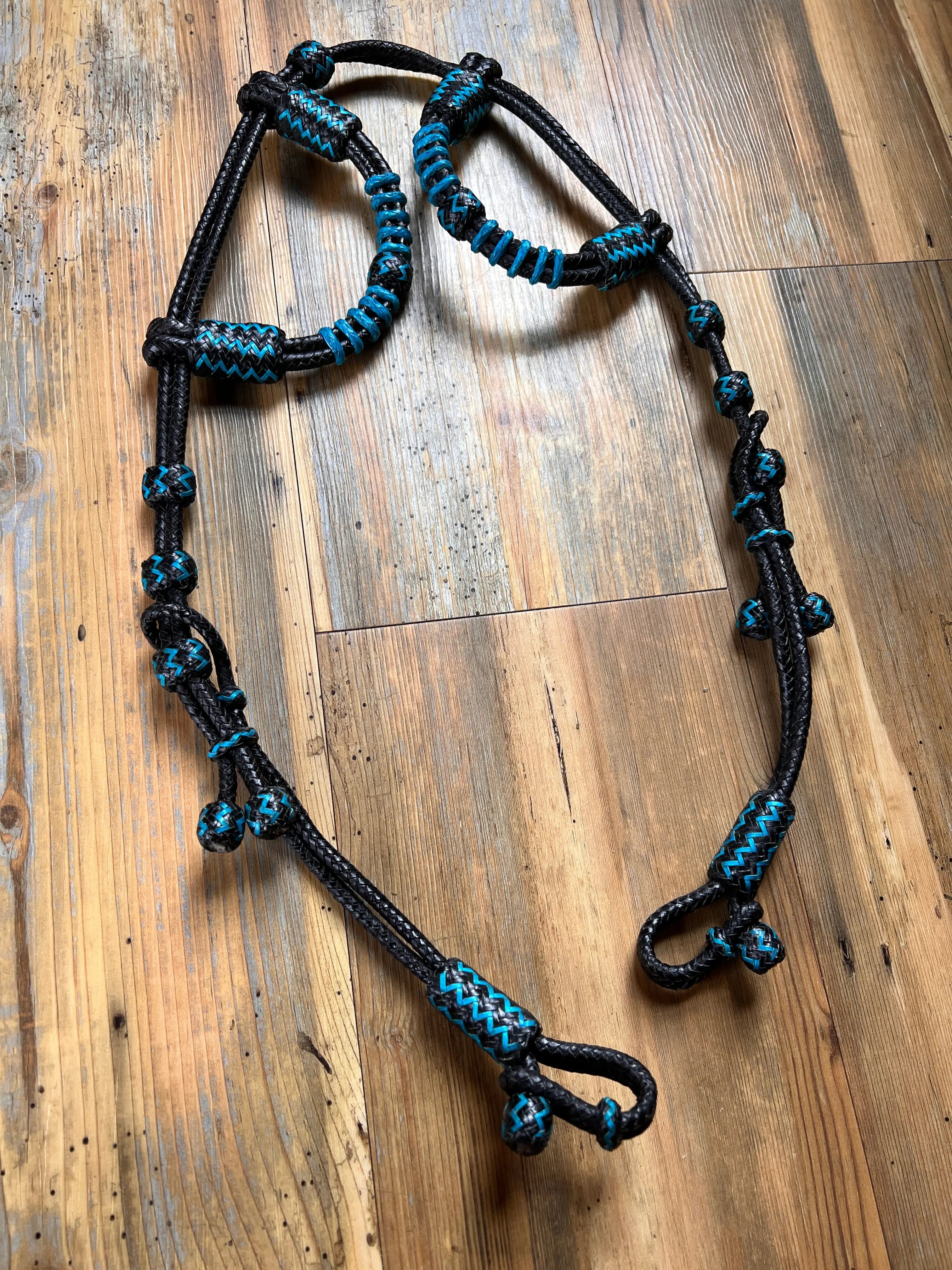 Black Rawhide Romal Reins With Two Ear Headstall