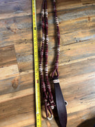 Maroon and cream 20-plait braided romal reins with dark brown leather bit