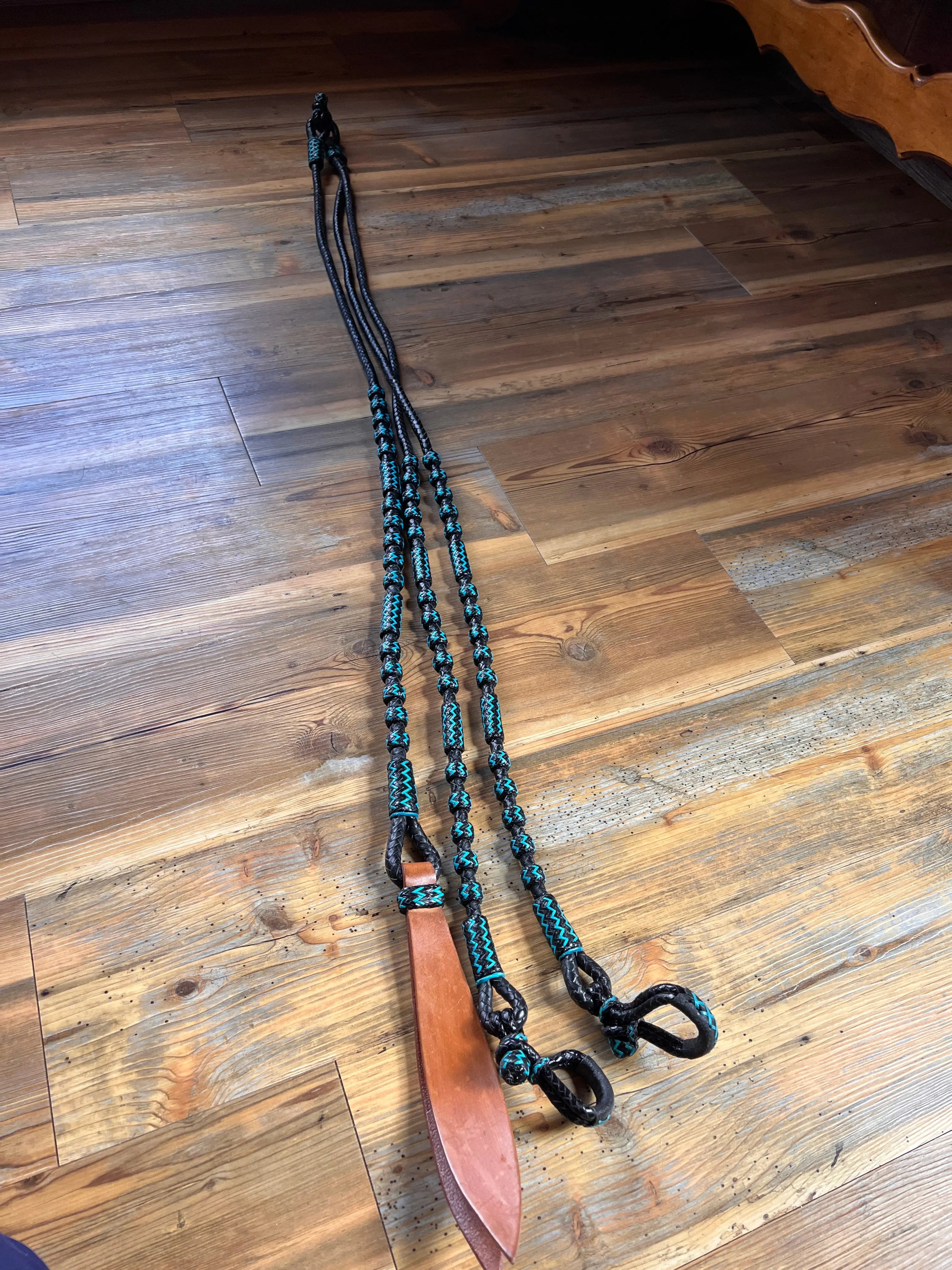 Black and Blue Rawhide 20 Plaits Romel Reins, Romal Reins 55"