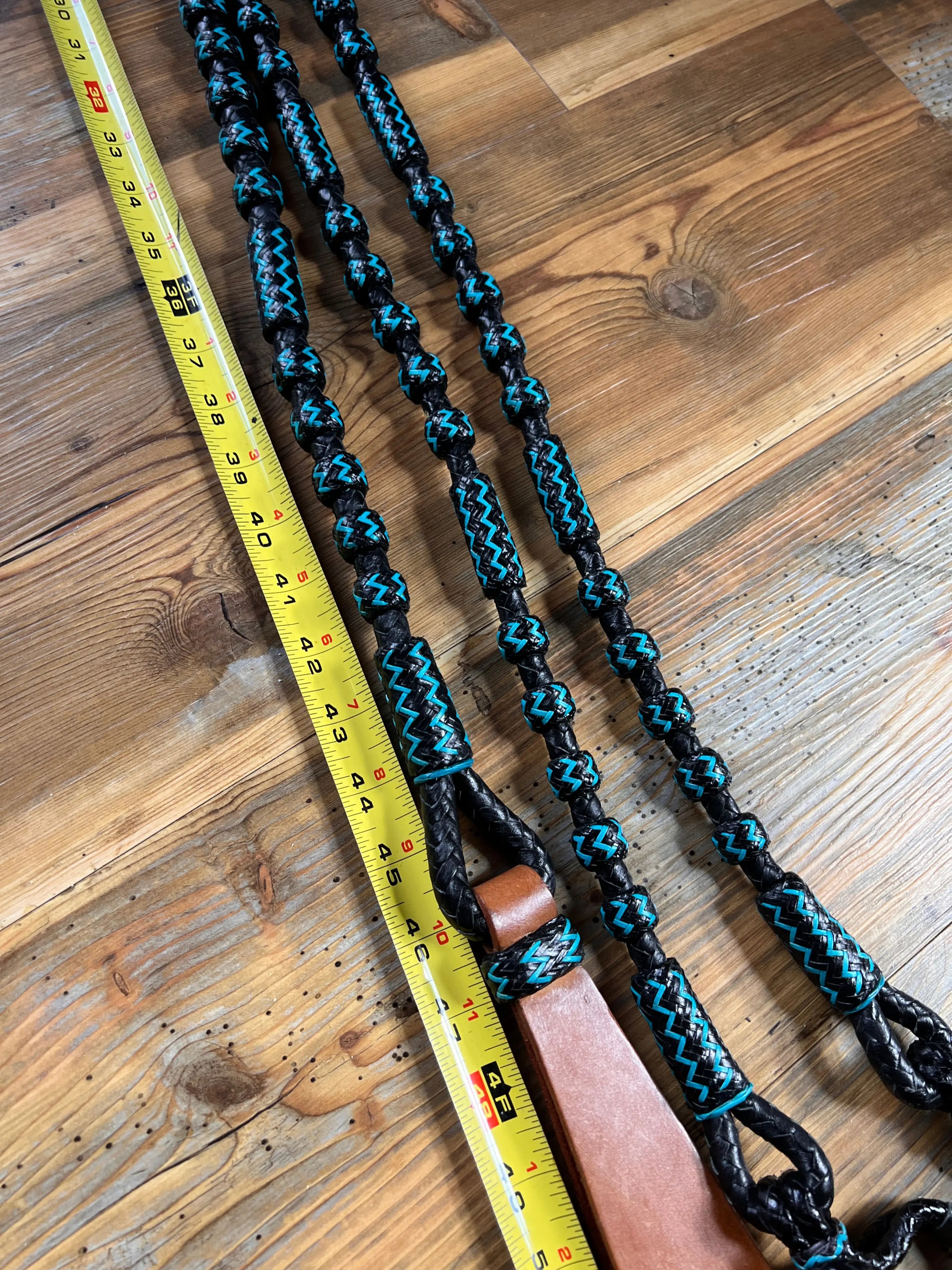 Black and Blue Rawhide 20 Plaits Romel Reins, Romal Reins 55"