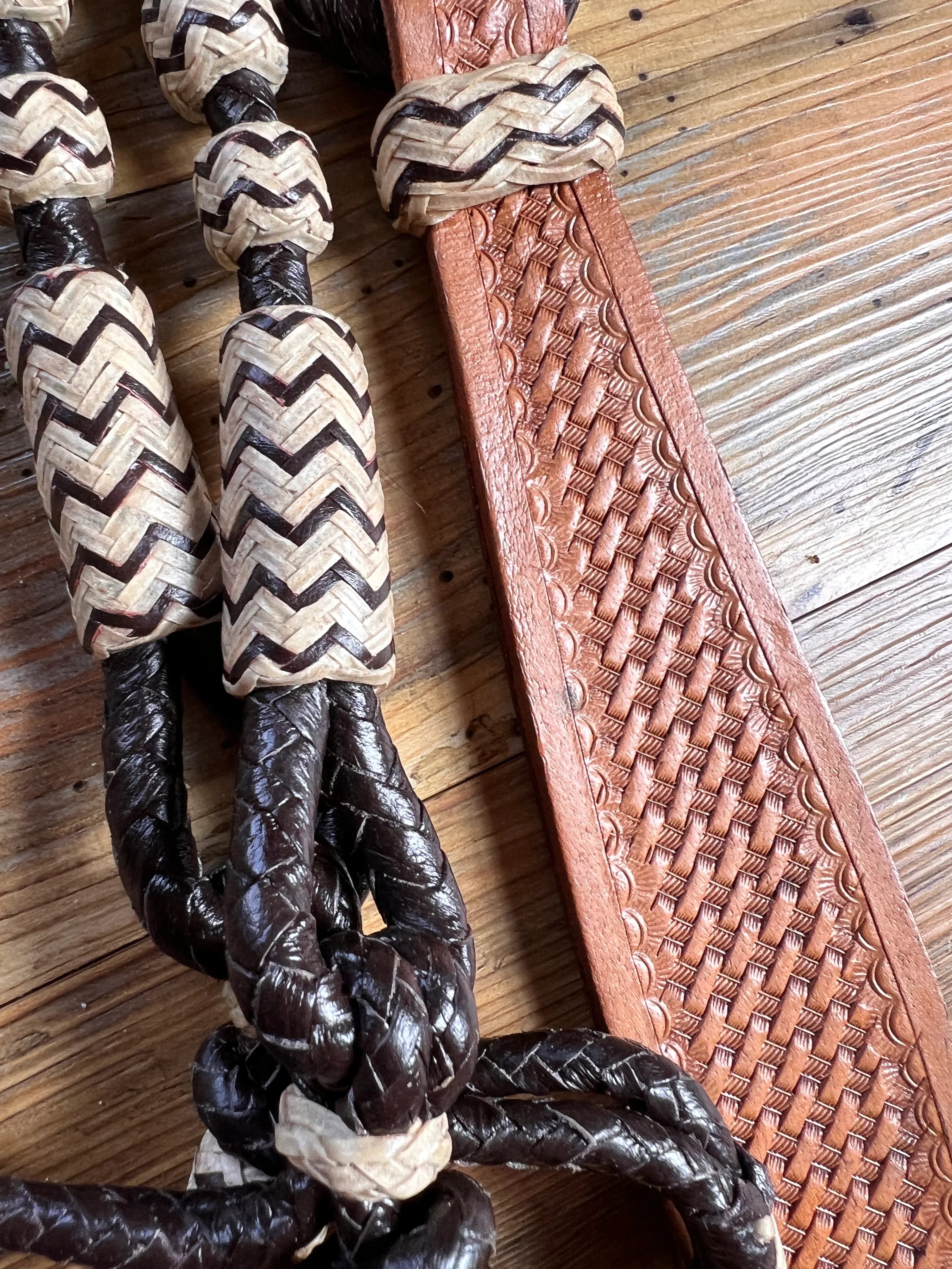 Dark brown 10-plait romel reins, 55 inches with connectors and zigzag beaded leather