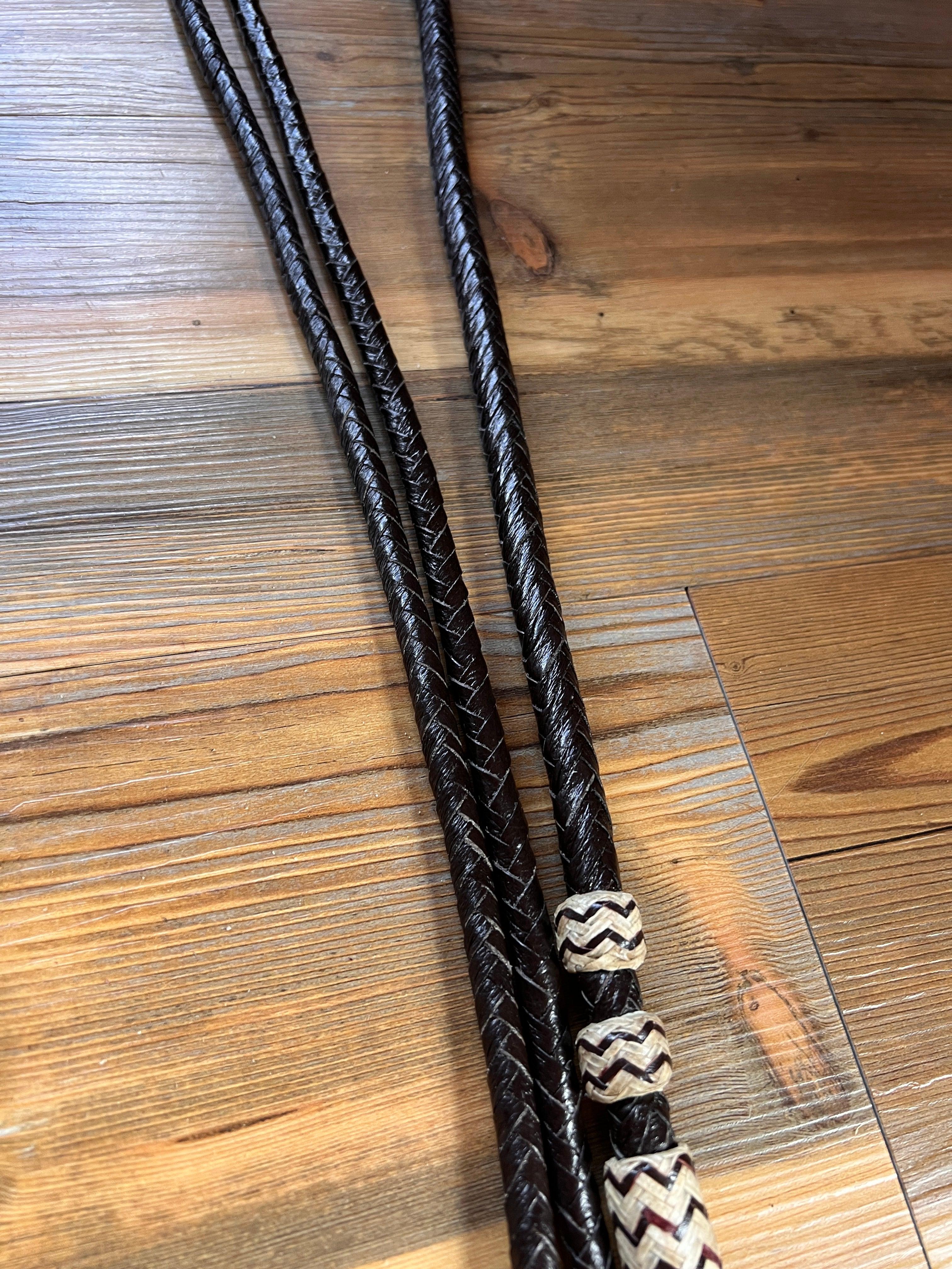 Black braided leather lanyard with cream zigzag beads on Romal reins