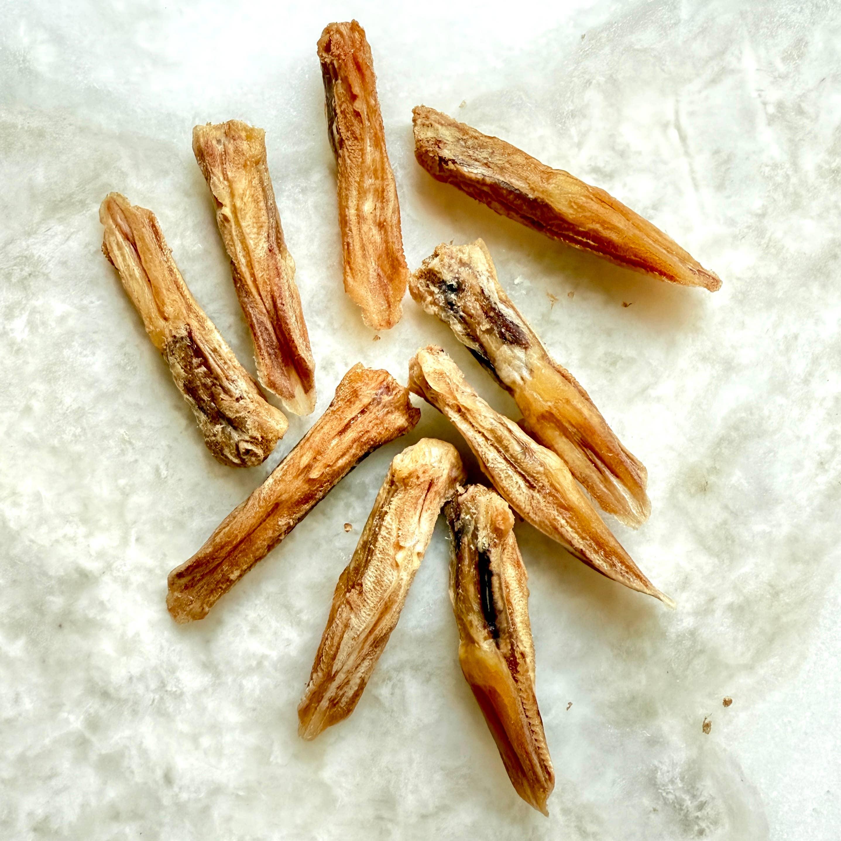 Freeze-dried Duck Tongues treats in light brown circular pattern
