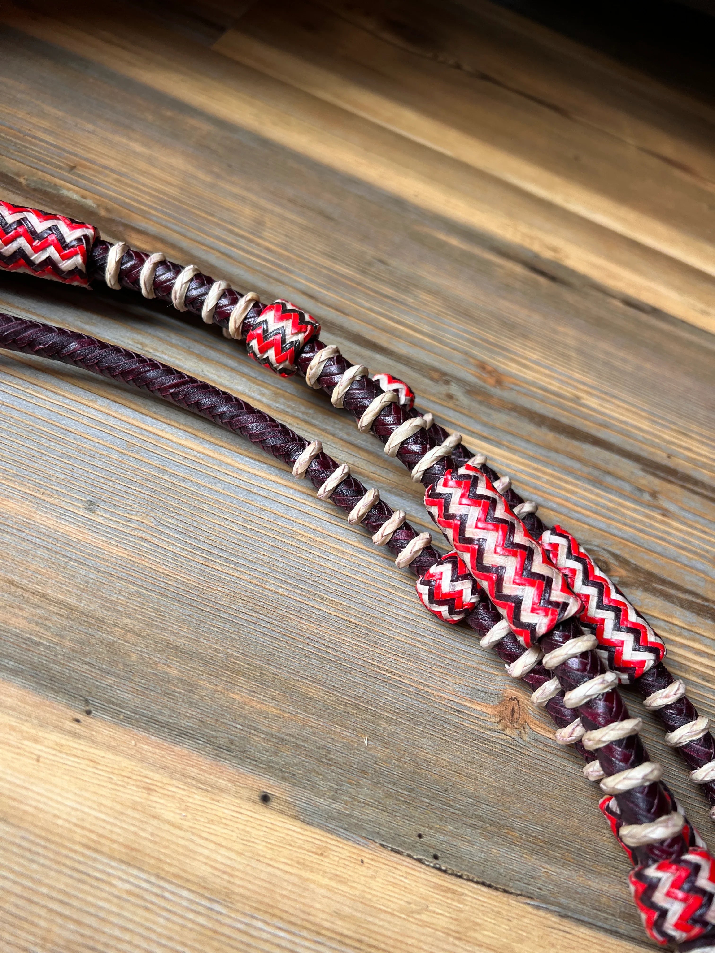 Red white zigzag leather romal reins dark cherry California style 55 inch