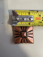 Copper pyramid embossed shape concho
