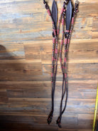 Black leather horse headstall with red white braided accents California style