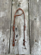Brown leather Argentina one-ear horse halter with cheetah print lacing